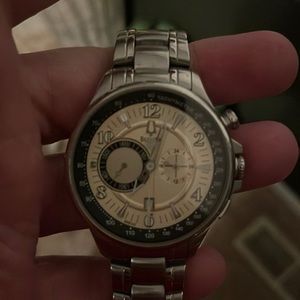 Tan faced Bulova in working condition minor scuffing on the band